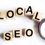Local business owner checking SEO results on laptop