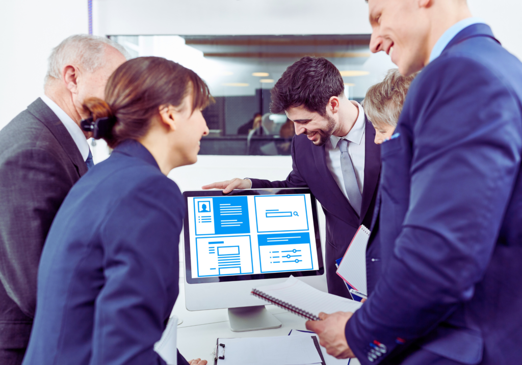 Business owner discussing SEO strategy with a digital marketing agency